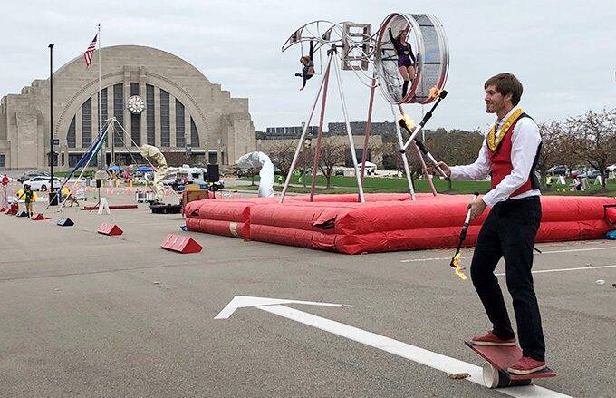 Circus performer in front of Cincinnati Museum Center