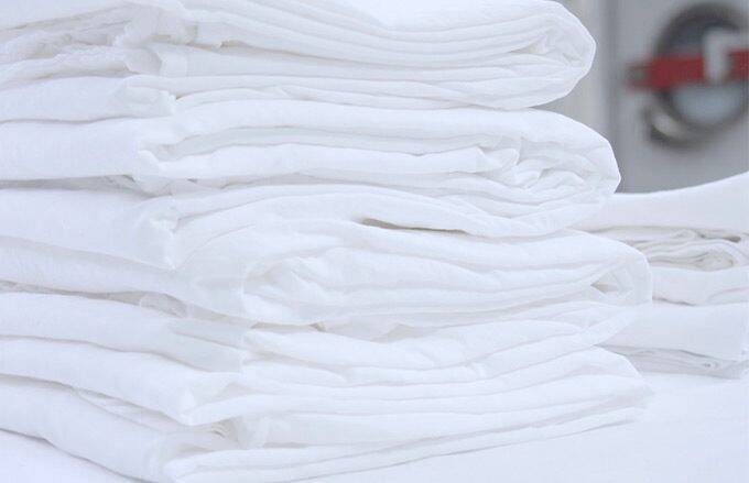 Stack of towels in hotel laundry