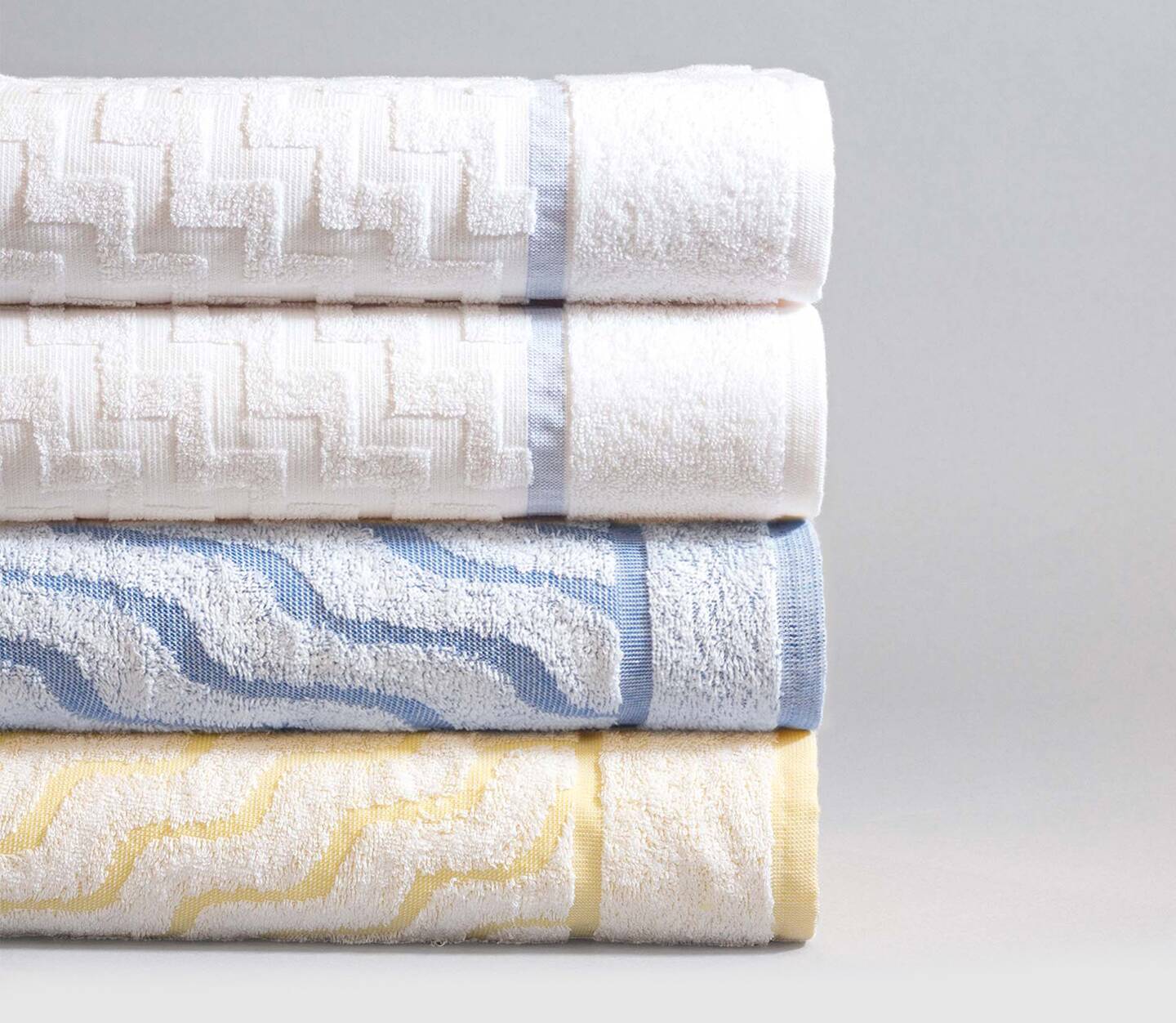 A stack of our complete collection of EuroSpa pool towels.