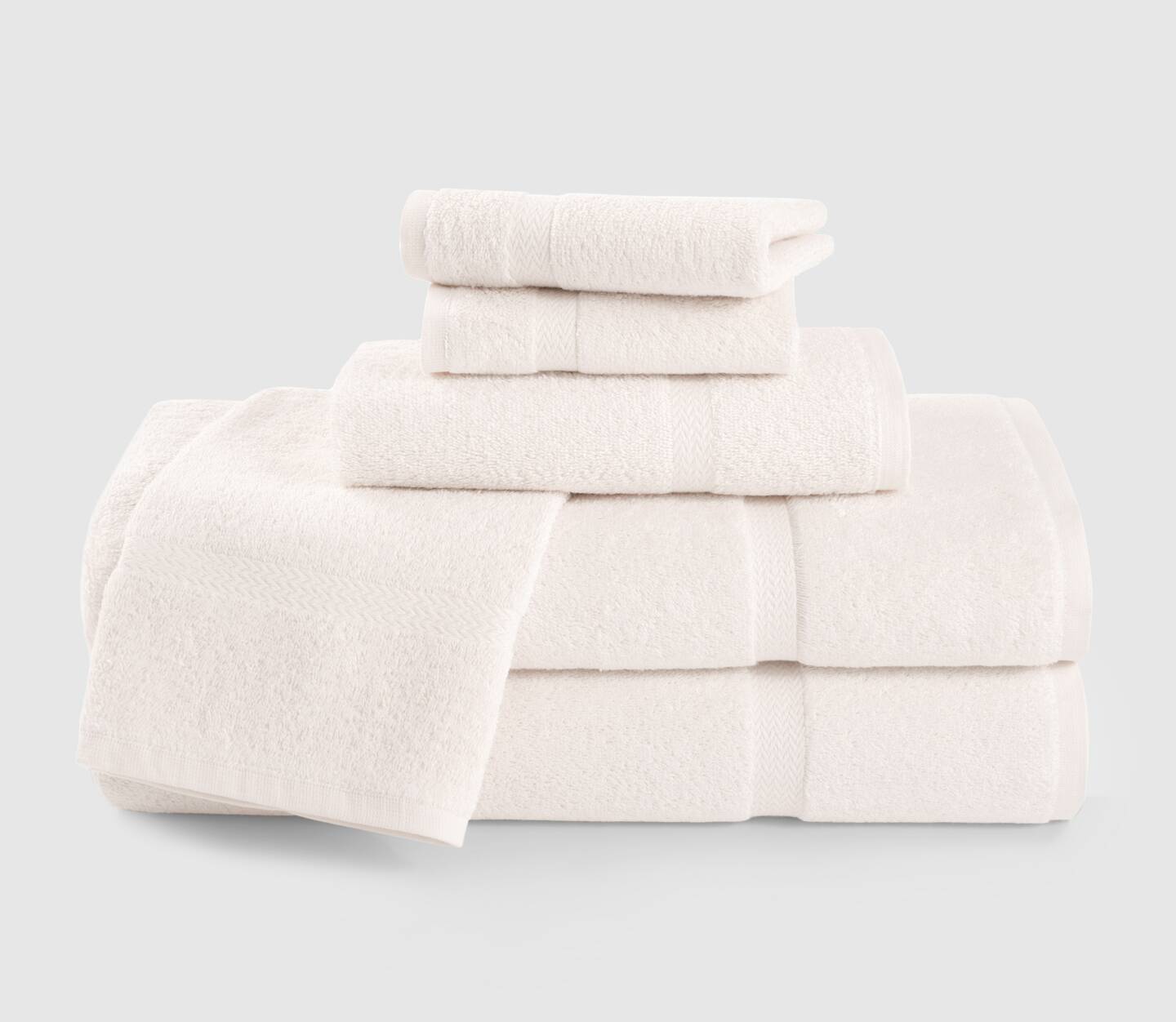 Stack of Mystique bath towel, hand towel and wash towel