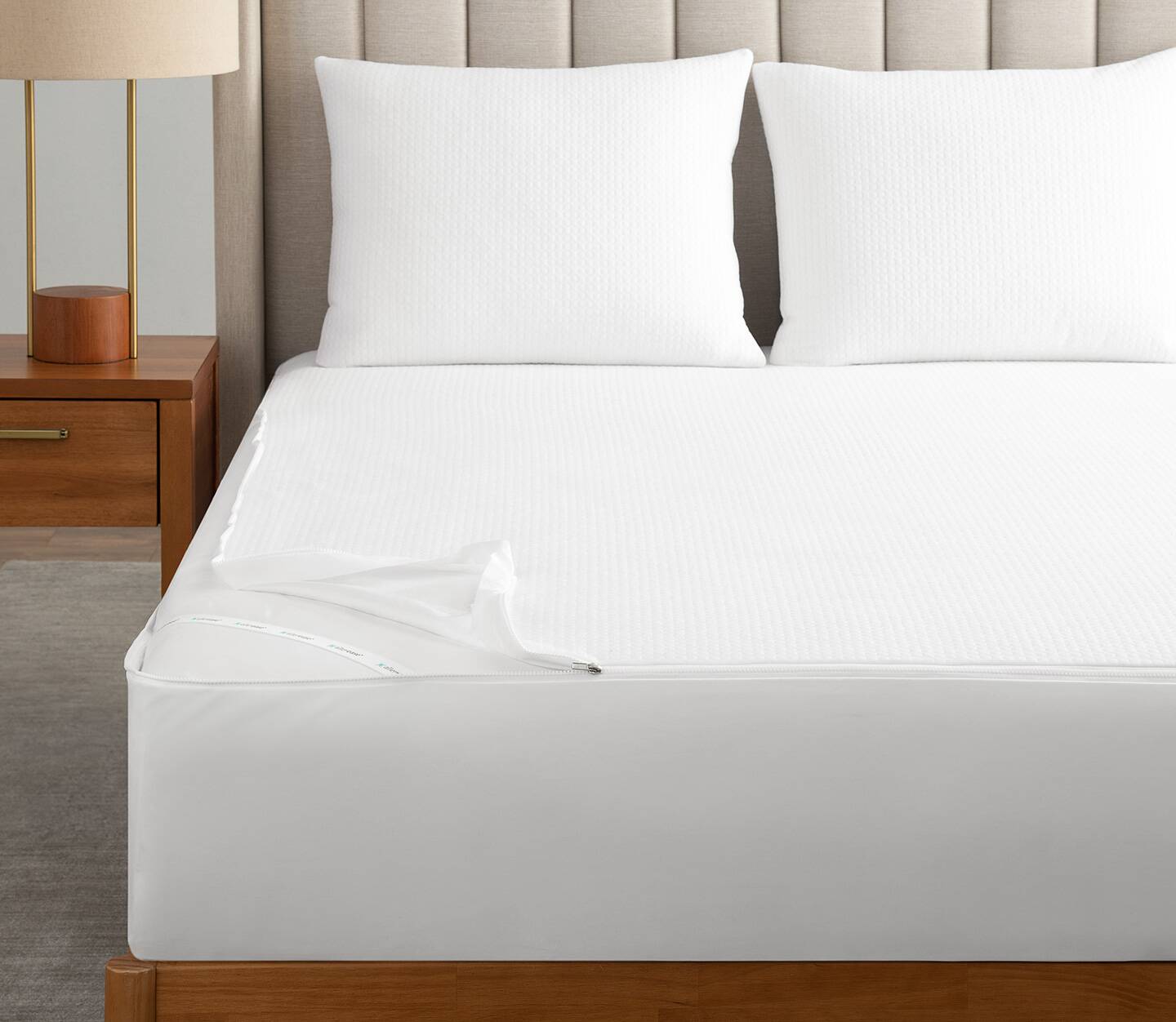 AllerEase® Platinum Mattress Encasement. Shown on a bed in an hotel environment.